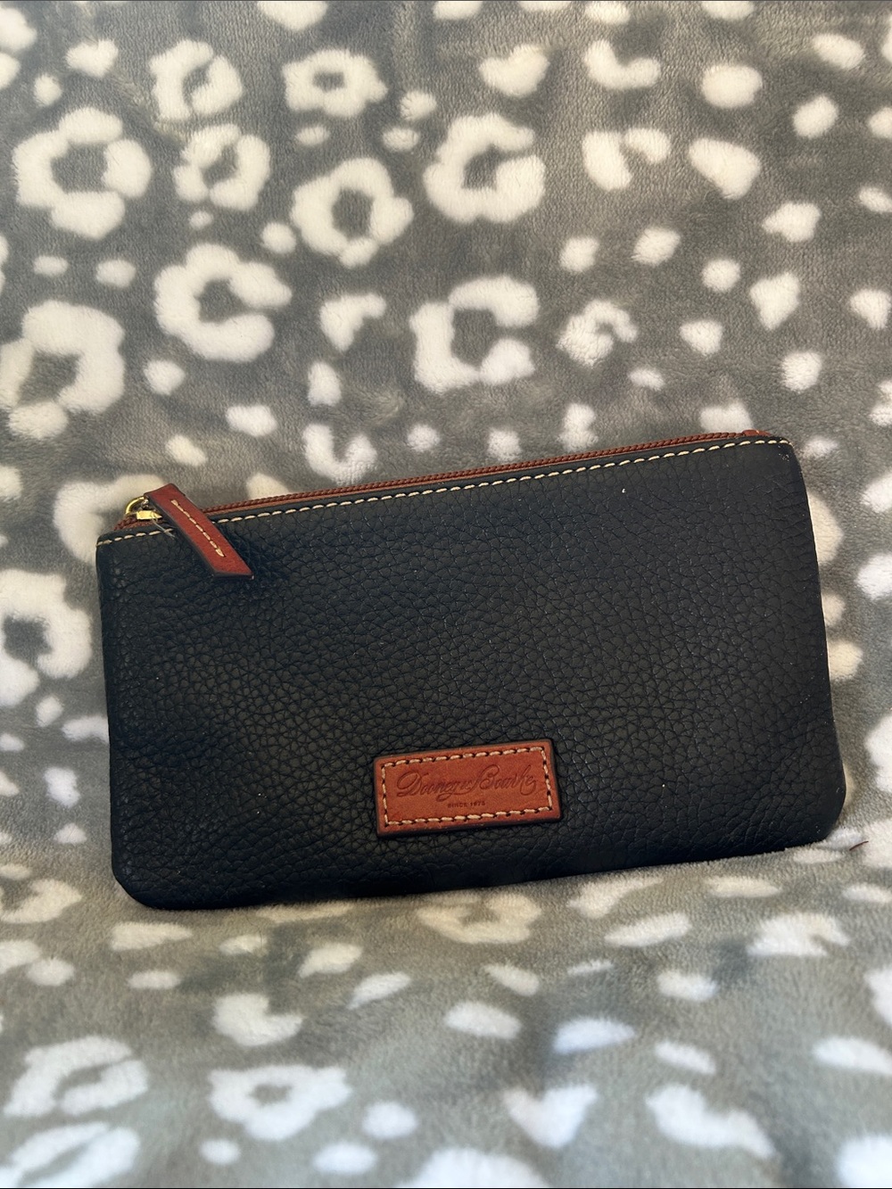 Dooney & Bourke Black Leather Pouch with Brown Trim